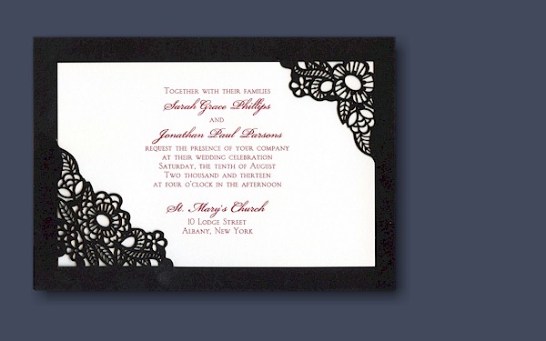 intricate swirls that grace the front cover A bright white invitation intricate swirls that grace the front cover A bright white invitation